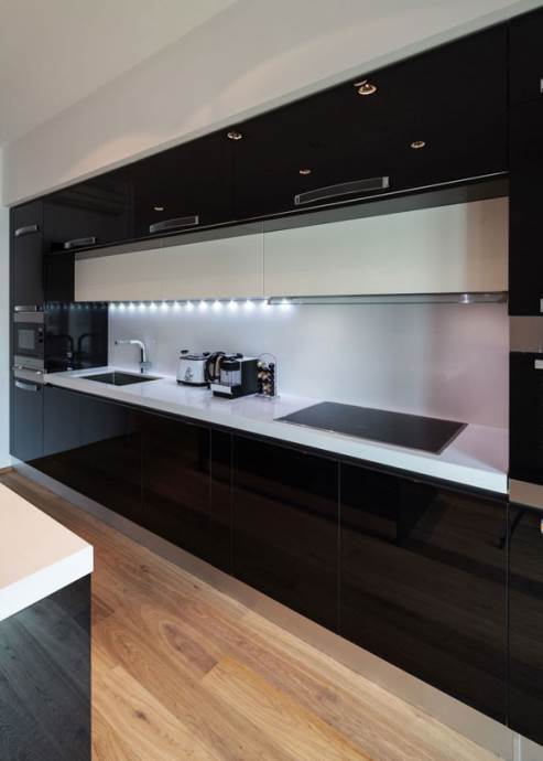 glossy black kitchen
