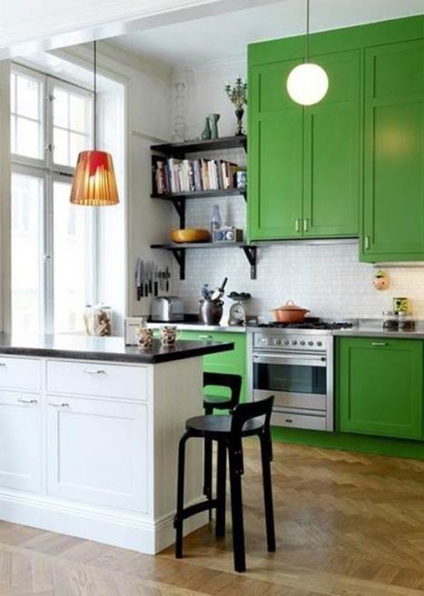 green kitchen with high ceiling