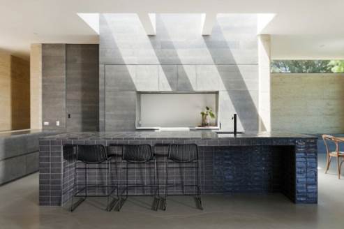 the beautiful kitchen island with hand made tiles