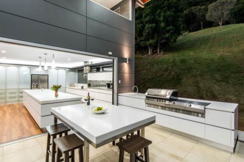 kitchen connected to outdoor kitchen