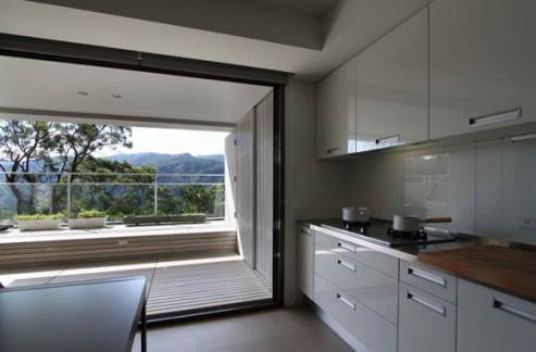 white kitchen with great view